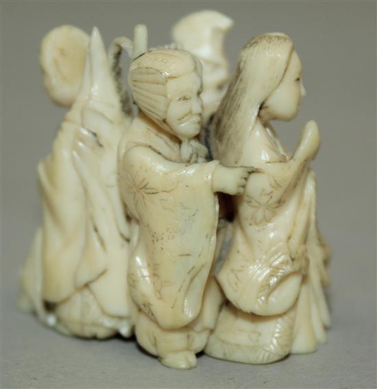 A Japanese small ivory okimono of six immortals, 3.3cm